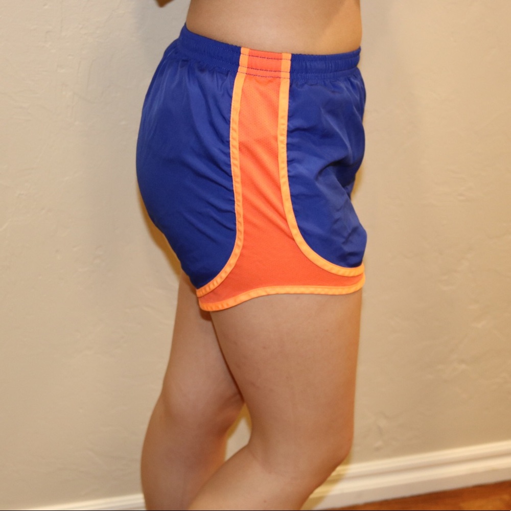 nike tempo size XS blue & neon orange